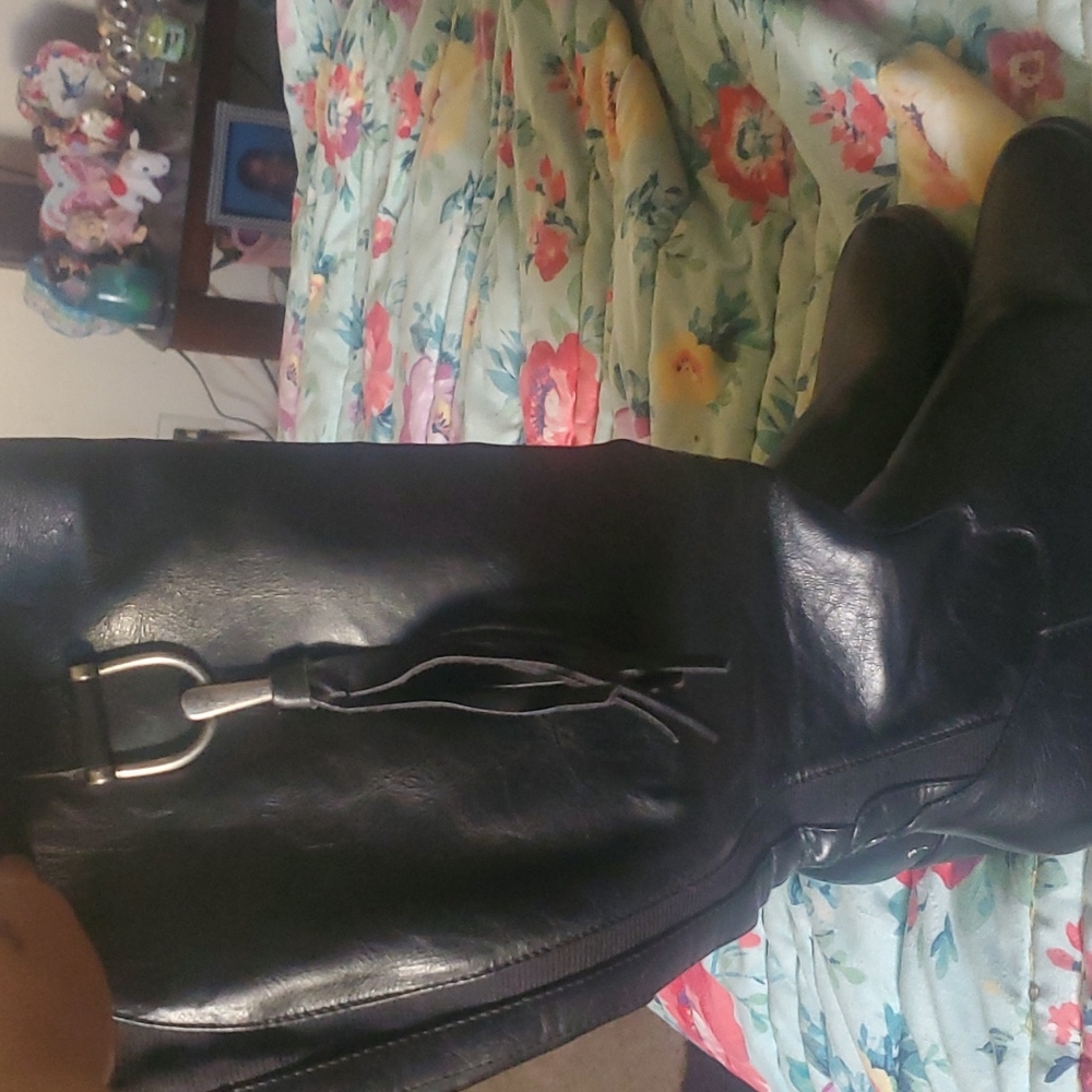 Black boots under knee length